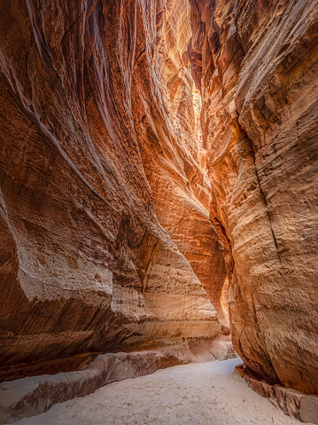The way to the Petra In Jordan, between the rocks with the morning sun, beautiful colors of the rocks