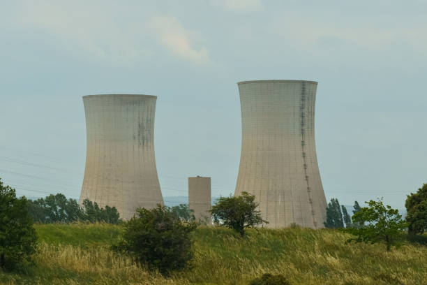 Two towers in the distance of the Trillo Nuclear Power Plant located in the town of Trillo-Guadalajara (Spain). Vertical. Copy Space