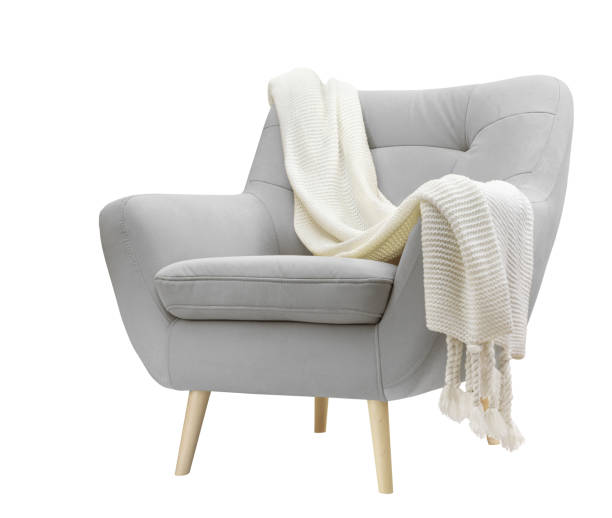 istock Comfortable velour Armchair with knitted plaid on white background 2062774371