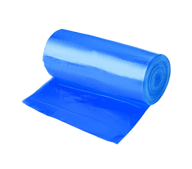istock roll of blue plastic garbage bags isolated on white background 2062774923