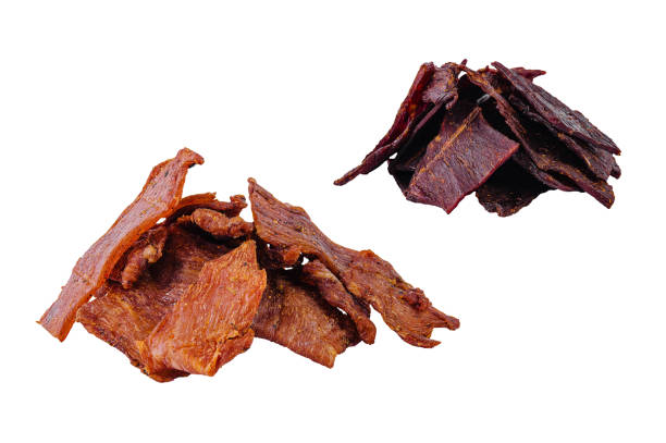 istock Dried beef and pork jerky isolated on white background 2062774941