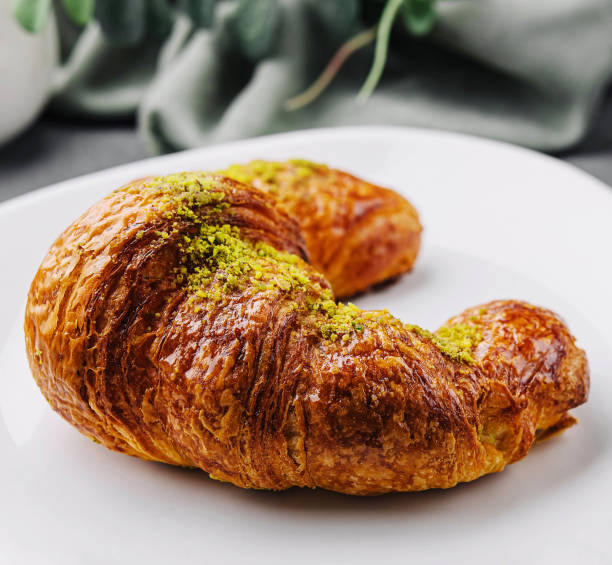 istock Pistachio Croissant on plate closeup 2062774961