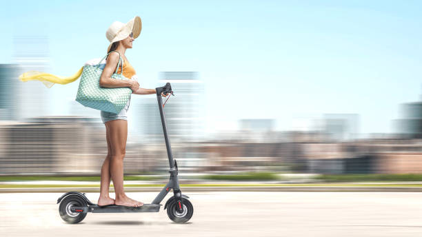 istock Happy tourist riding an electric scooter 2062782991