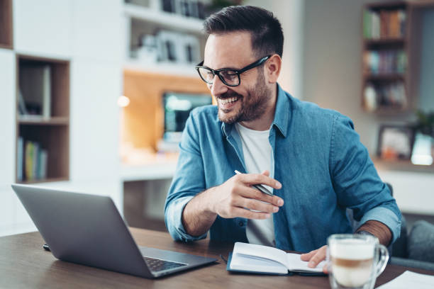 istock Man working comfortably from his home 2062787912