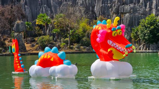 istock Dragon-shaped float in a serene lake, Shilin Stone Forest in China 2062822389
