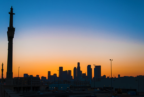 A scenic view of Los Angeles skyline at sunset in California