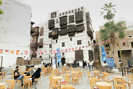 Historical urban scene with outdoor cafe setting, Jeddah, Saudi Arabia