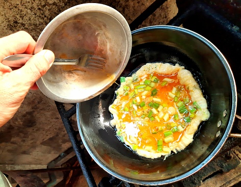 Cooking vegetable omelet - food preparation.