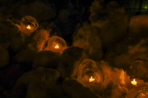 Ice and snow lanterns in the snow.