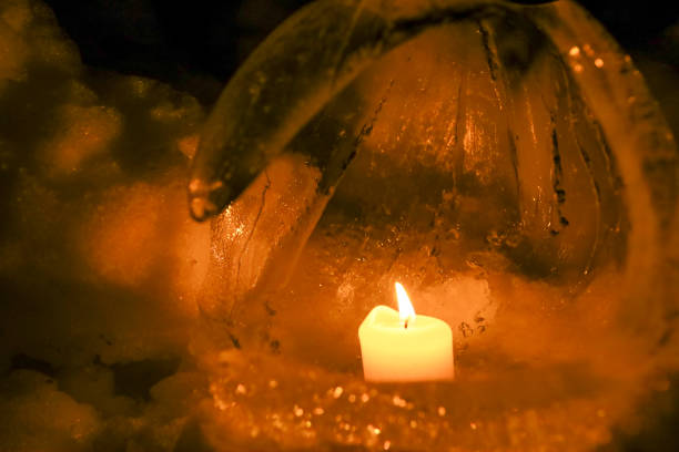 Ice and snow lanterns in the snow.