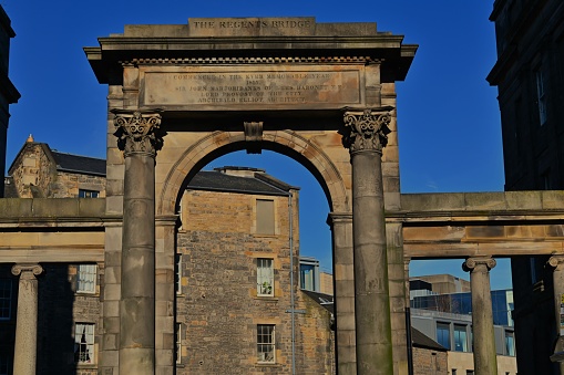 A view of decorative arches on the Regents bridge in the city of Edinburgh.