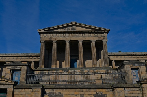 A view of an impressive colonnaded façade on a disused building in Edinburgh
