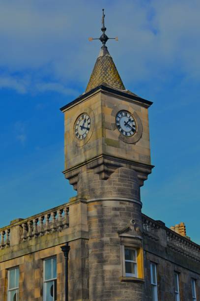 Tower clock five minutes to twelve