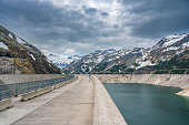Kölnbrein Dam in the Maltatal Carinthia Austria during an overcast springtime day