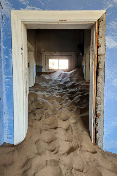 istock Old, abandoned sand-filled building in the desert. Kolmanskop, Namibia. 2062914120