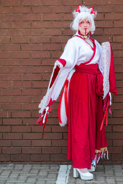 istock Female cosplayer in a cat priestess outfit at Comic Con 2062917243