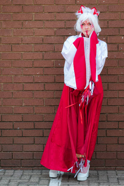 istock Female cosplayer in a cat priestess outfit at Comic Con 2062917244