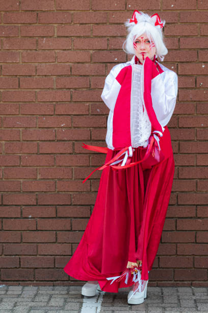istock Female cosplayer in a cat priestess outfit at Comic Con 2062917253