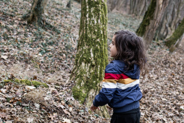 istock Little boy is having fun and playing in the public park. 2062918905