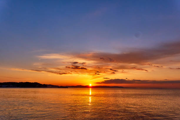 istock Scenic view of ocean during sunrise 2062926032
