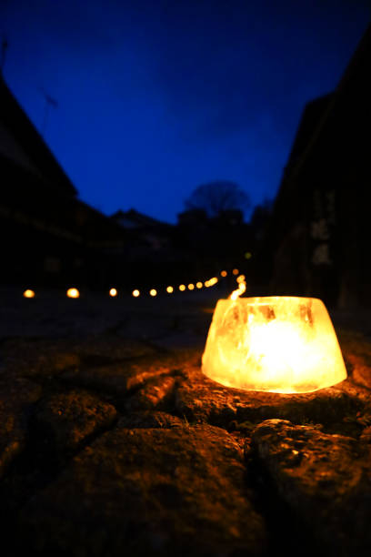 istock Ice lanterns that illuminate the road at night in winter. 2062929212