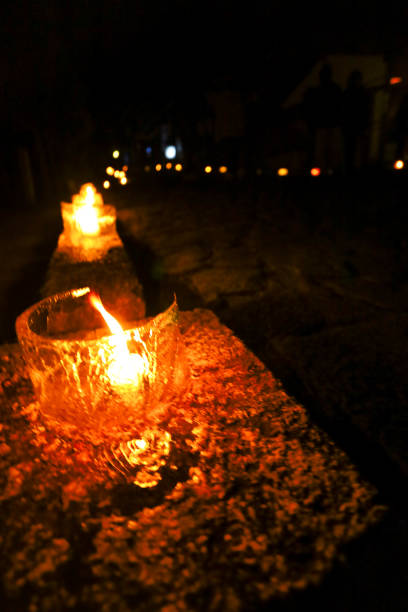 istock Ice lanterns that illuminate the road at night in winter. 2062930297