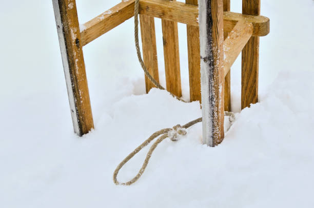 Little rustic sledge with burlap bag