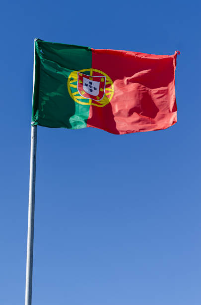 istock Portuguese flag on a blue sky background 2062938394