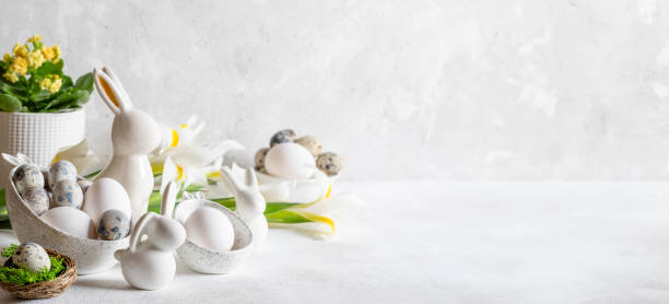 istock Elegant holiday white banner with traditional Easter decorations and eggs. Copy space. 2062942050