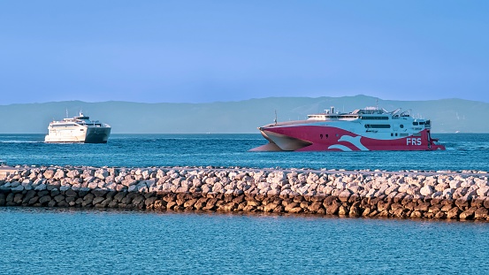 Tanger, Morocco – July 20, 2023: The ships sailing past each other in Tanger, Morocco