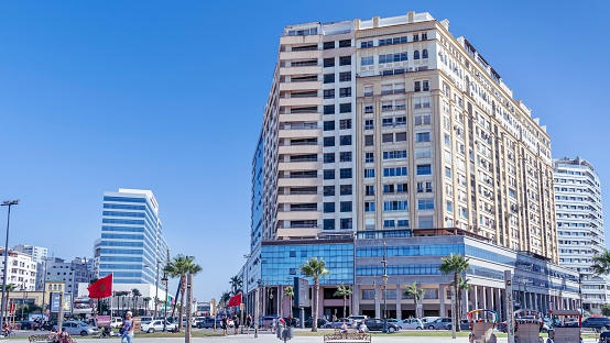 Tanger, Morocco – July 20, 2023: A busy street in Tanger, Morocco with modern architecture and cars