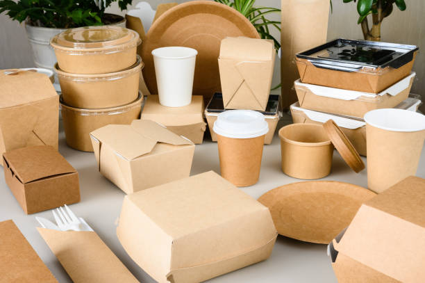 istock Disposable paper tableware is on the table. Eco-friendly food packaging. Zero waste and recycling concept 2062973278
