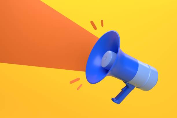istock Blue megaphone on an orange and yellow background 2062991994