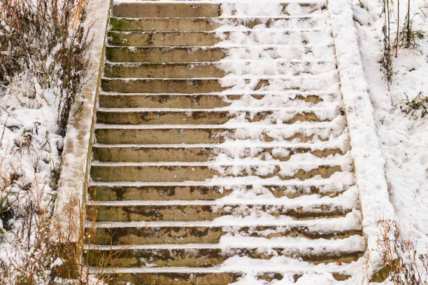 istock A half of staircase covered in snow 2063006894