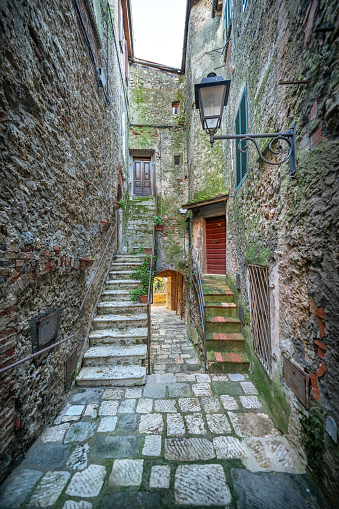 Narrow alley in a medieval village in Grosseto Province