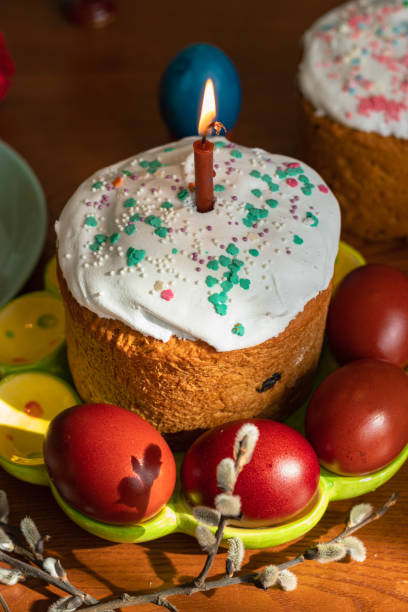 istock Elegant Easter cakes with burning candles on the dining table 2063102895