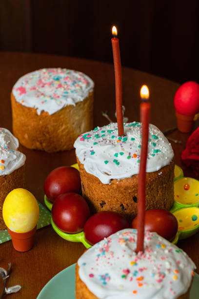istock Elegant Easter cakes with burning candles on the dining table 2063102910
