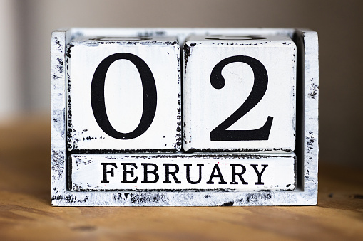 February 2nd, 02 cube calendar on wooden table