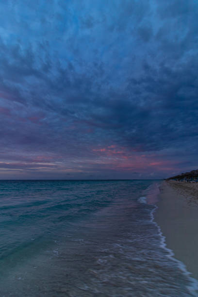 Clouds, sea, ocean, sand, water.
