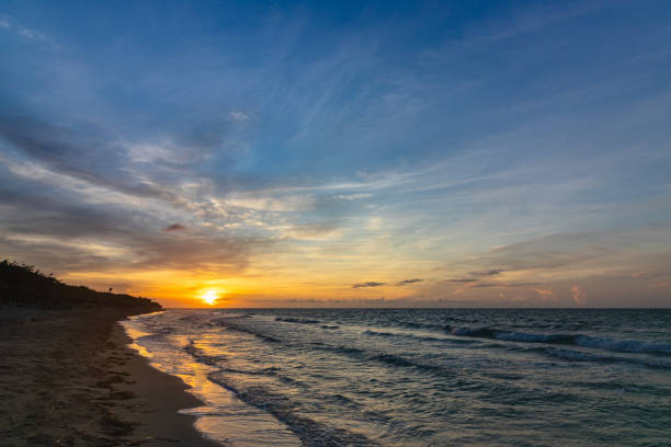 istock Beautiful sunset on the ocean shore in the evening 2063137854