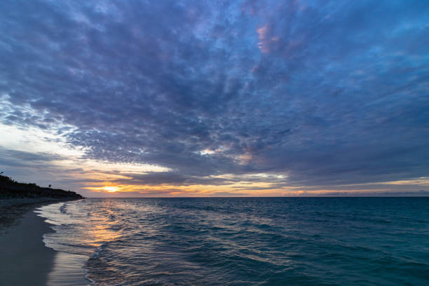 istock Beautiful sunset on the ocean shore in the evening 2063138462