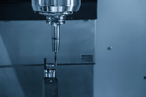 CNC auto tool length  measurement process. The tool length compensation value input.