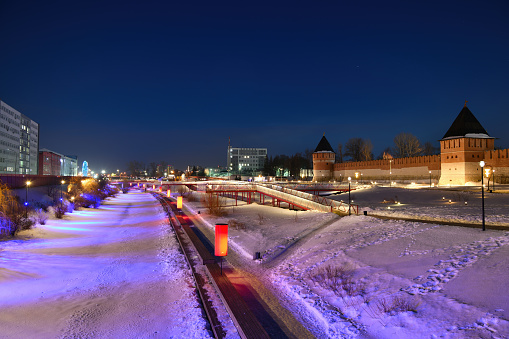 Panoramic night view of the Kazan embankment of the Upa River and the Tula Kremlin. Winter night. Tula, Russia