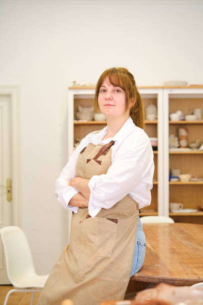 istock Portrait of a proud artisan in pottery workshop 2063164543