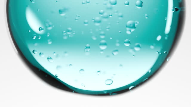 Close-up blue realistic liquid and bubble