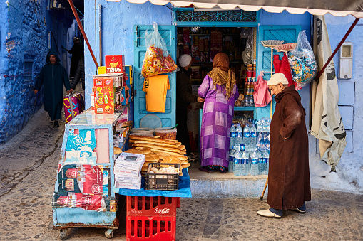 Shopping street local store in blue city of Chefchaouen, Morocco, North Africa.