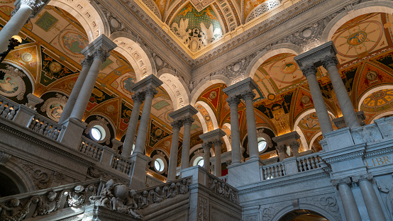 The beautiful ceiling of the Library of Congress in Washington DC. It is the largest library in the world and a public building.