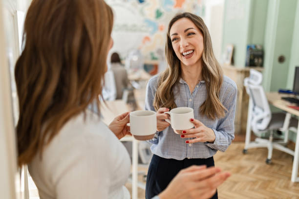 istock Businesswomen Uniting on Office Break 2063224036