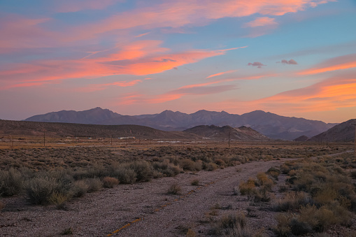 A dirt road near the small town of Beatty at sunset, Nevada, Nye County
