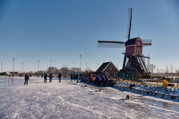Leeuwarden, Netherlands - February 10, 2012. Outdoor scene showing a classic dutch windmill in winter.